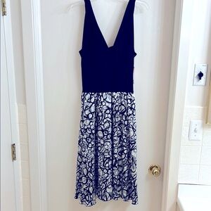 Fun silky black silver and cream cocktail dress w/plunge front neckline, size 12